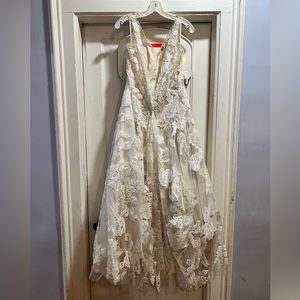 Size 15 fitted to me, my wedding dress worn once!